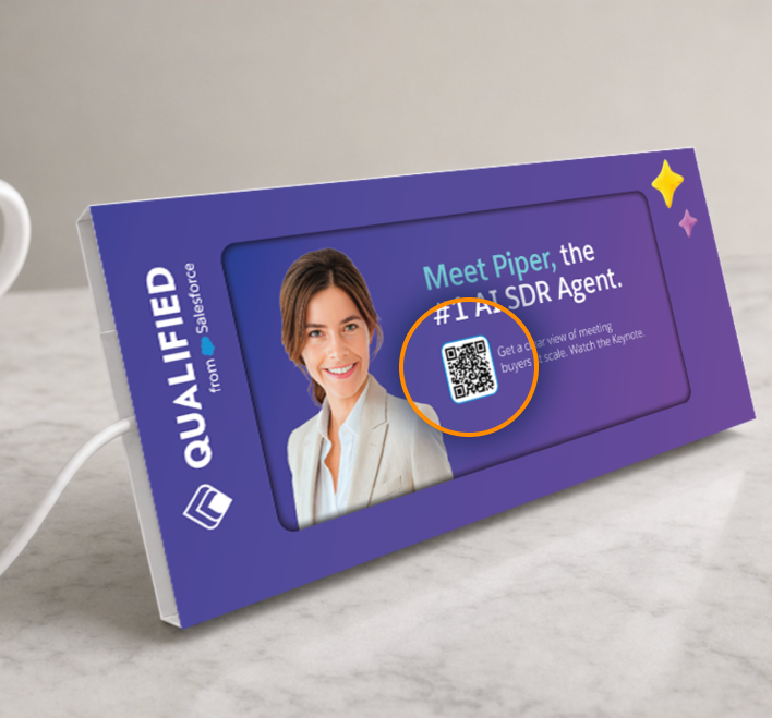 A purple event-branded Wrapstanz display featuring a QR code